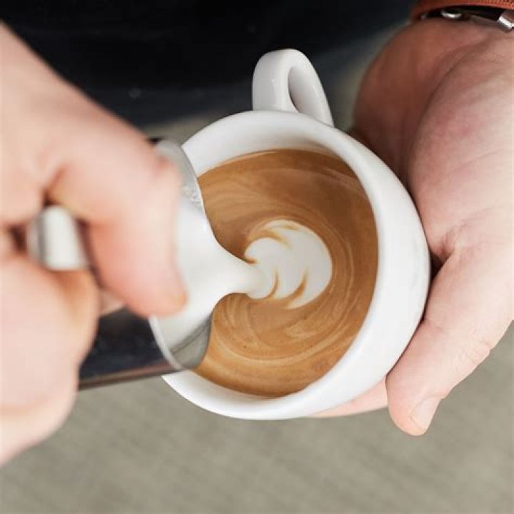 How to pour frothed milk into espresso?